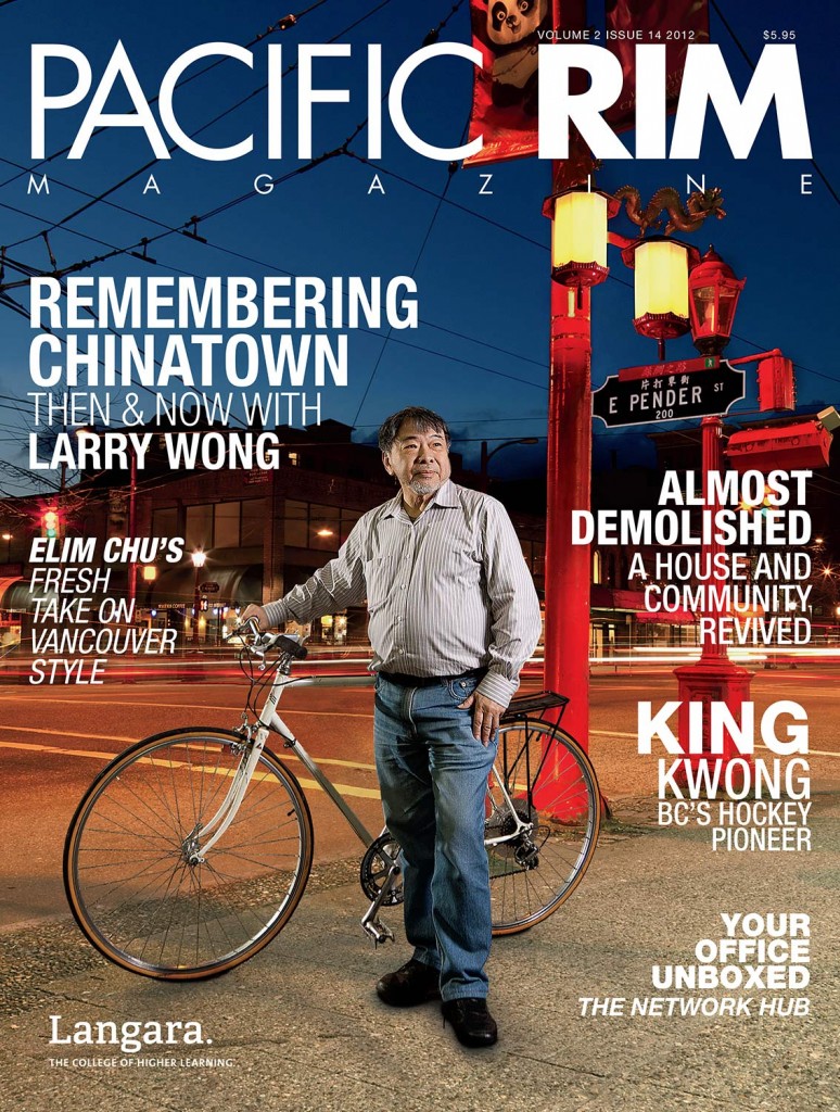 2012 Pacific Rim Cover, "Remembering Chinatown." Image of man standing next to bicycle in Chinatown.